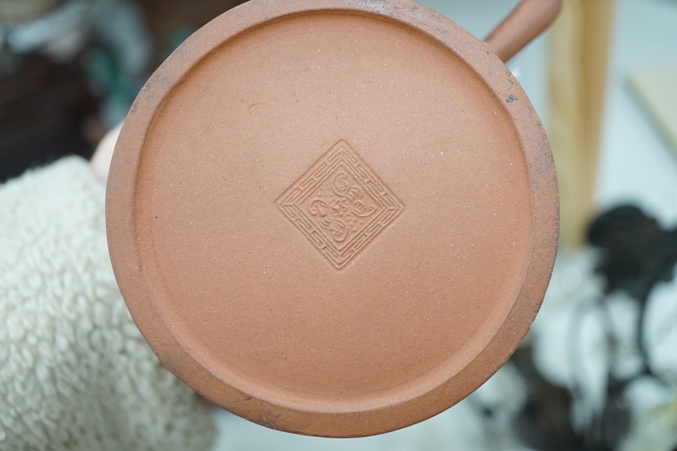 A quantity of Chinese Yixing teapots, a cinnabar resin jar and cover, a Samson teapot etc.
